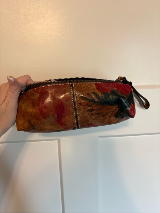Patricia Nash Handbags - Patricia Nash Brown Floral Leather Wristlet Pouch with Red and Black Accents